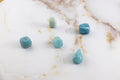 Aquamarine rolled stone
